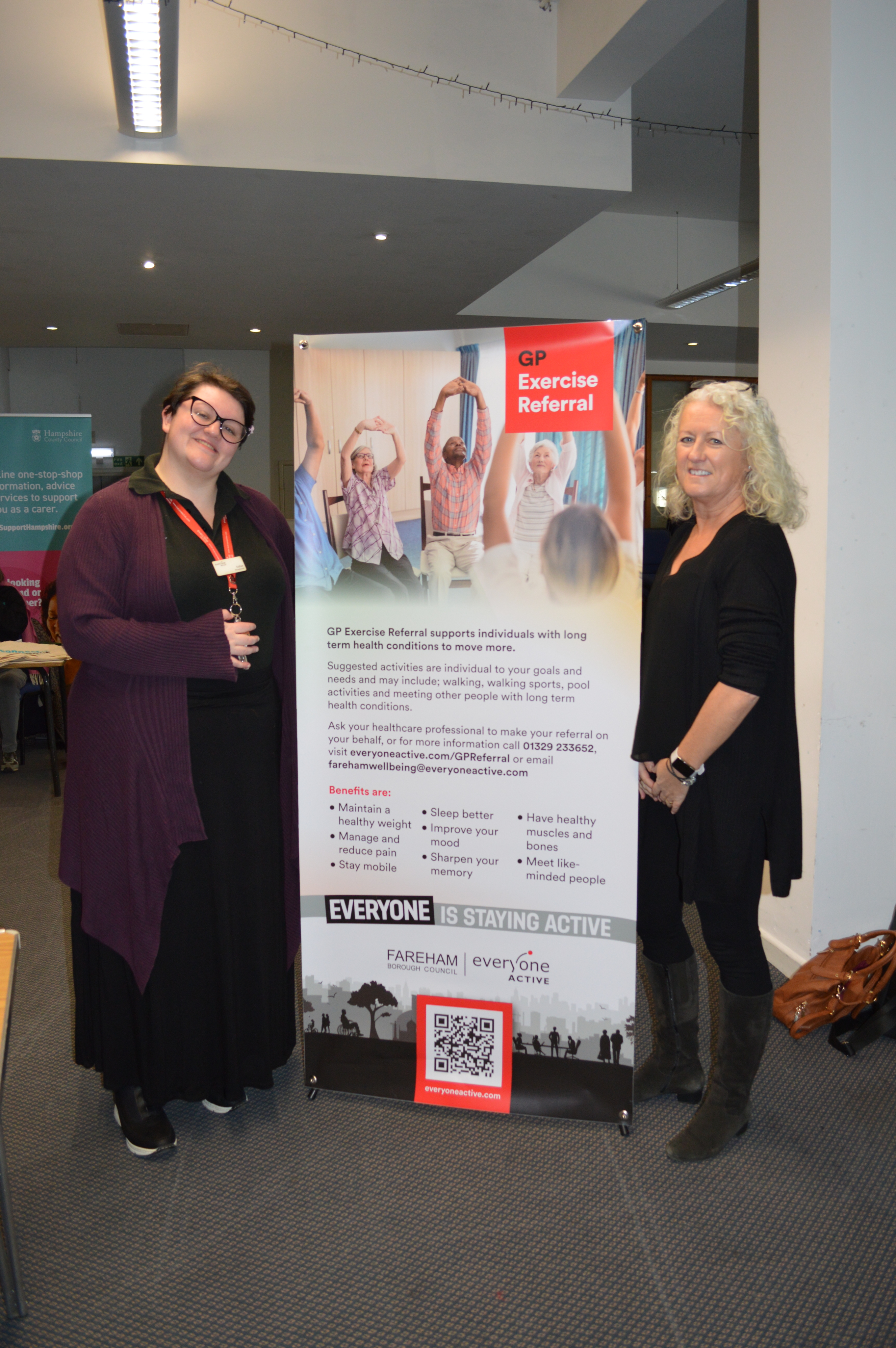 Everyone Active team in front of a banner at a recent Autism and Health event