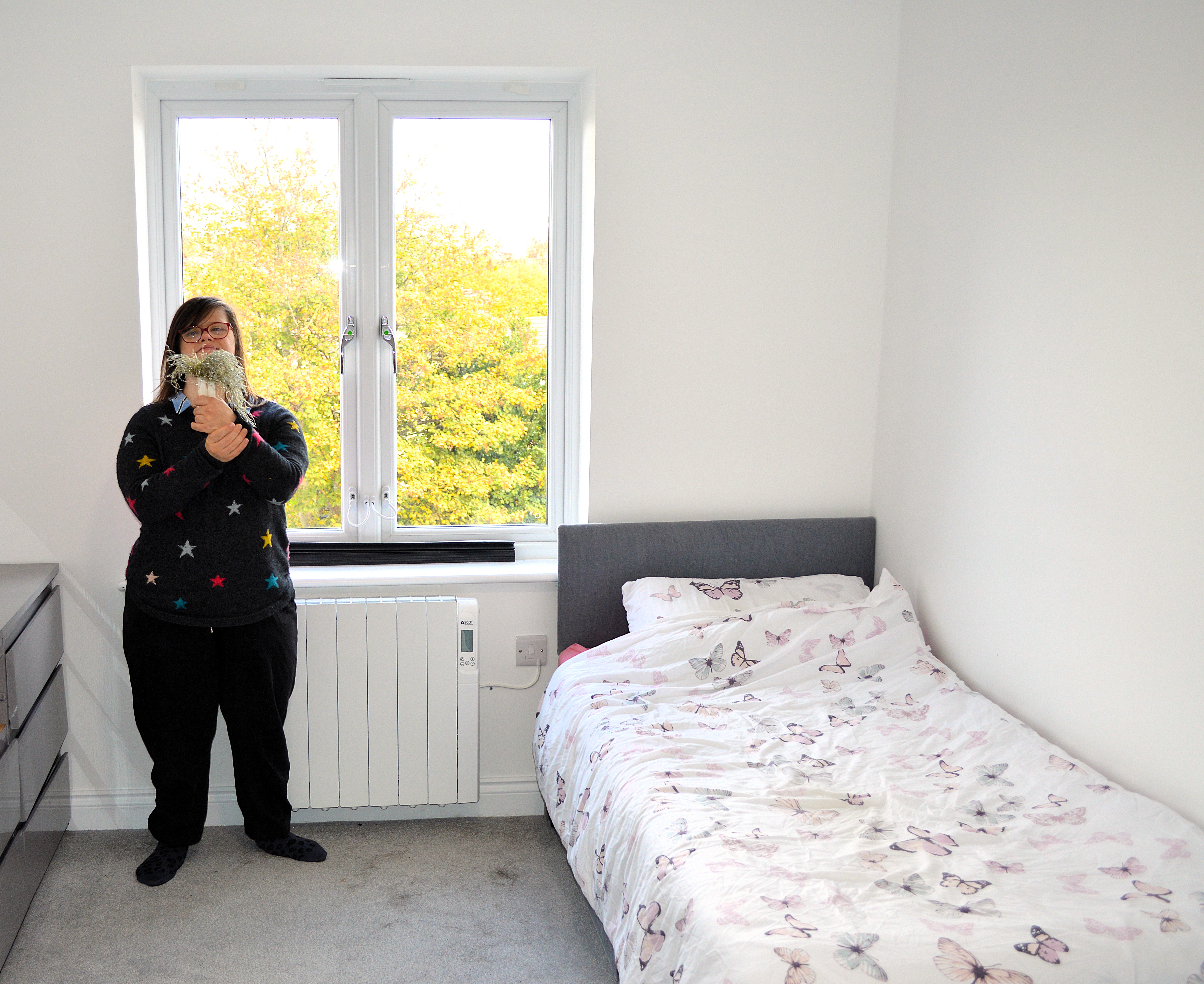 Rhi shows off her bedroom.