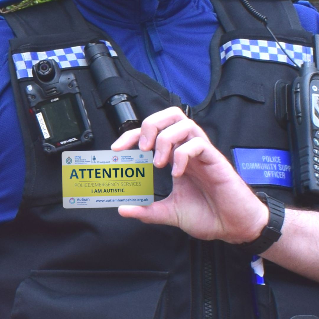PCSO holds up an autism alert card